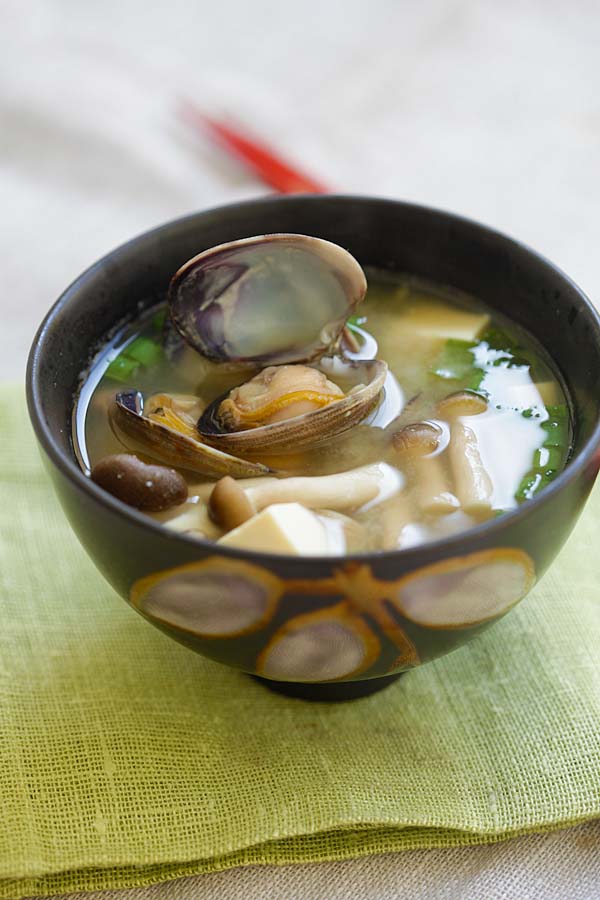 Quick and easy Japanese miso soup with Manila clams in a bowl ready to serve.