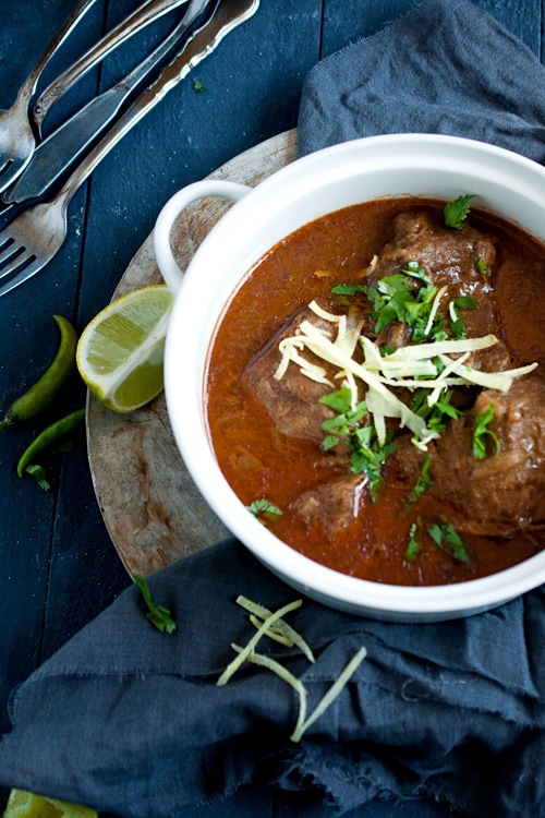 Delicious and hearty Indian Muslim beef stew topped with cilantro and ginger.
