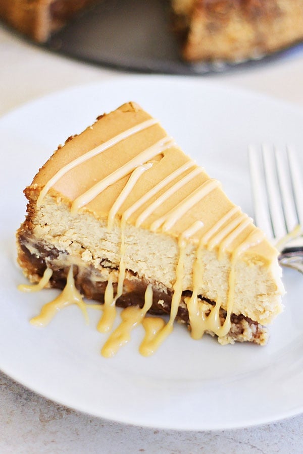 Pecan Pie Cheesecake frosted with brown sweet syrup.
