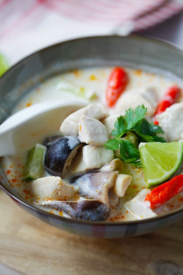 Delicious Thai coconut chicken soup or Tom Kha Gai in a bowl ready to serve.